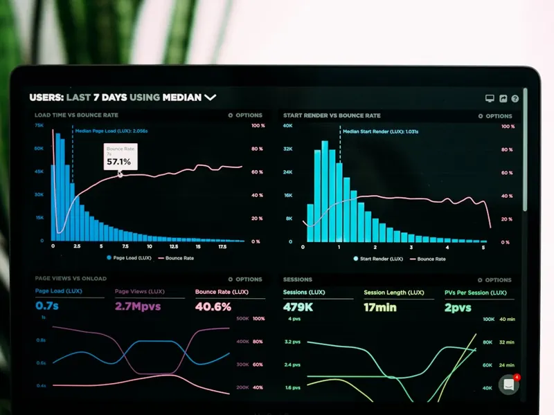 Professional reviewing an AI risk assessment dashboard on a laptop